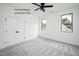 Bright bedroom with carpeted floors and natural light at 12845 Mallard Rock Rd, Zebulon, NC 27597