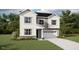 Charming two-story home with white siding, well-manicured lawn, and an attached two-car garage at 148 Sprenger St, Garner, NC 27529