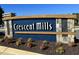 Crescent Mills community entrance sign with decorative stone and landscaping at 149 Gladstone Loop, Clayton, NC 27520