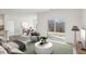 Staged living and dining area, offering comfortable seating and stylish decor at 149 Gladstone Loop, Clayton, NC 27520