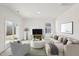 This staged living room offers stylish furniture and decor at 149 Gladstone Loop, Clayton, NC 27520