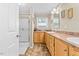 Bathroom features a walk-in shower, double vanity, and neutral finishes at 1510 Asbury Church Rd, Sanford, NC 27330