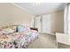 Neutral bedroom offering a daybed and two closets at 1510 Asbury Church Rd, Sanford, NC 27330