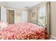 Comfortable bedroom featuring a queen bed, neutral walls, and natural light at 1510 Asbury Church Rd, Sanford, NC 27330