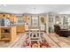 Inviting dining area boasts a wooden table set and bright, open layout at 1510 Asbury Church Rd, Sanford, NC 27330