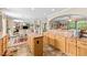 Open kitchen with ample cabinets and countertops is connected to the dining and living area at 1510 Asbury Church Rd, Sanford, NC 27330