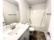 Bathroom features a single sink, vanity, and a shower/tub combo at 1667 Pecan Drive # 25, Nashville, NC 27856