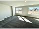 New bedroom with plush carpet and bright windows at 1667 Pecan Drive # 25, Nashville, NC 27856