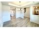 Elegant dining room features chair rail molding, a chandelier, and seamless access to kitchen and living areas at 1667 Pecan Drive # 25, Nashville, NC 27856