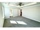 Large main bedroom with trey ceilings, fan, carpet, and neutral paint at 1667 Pecan Drive # 25, Nashville, NC 27856
