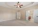Large bedroom with trey ceiling and ensuite bathroom at 1910 Morehead Hill Ct, Durham, NC 27703