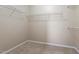 Walk-in closet with wire shelving and carpeted floor at 1910 Morehead Hill Ct, Durham, NC 27703