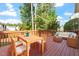 Inviting deck furnished with a dining table and comfortable seating for entertaining or enjoying outdoor meals at 1910 Morehead Hill Ct, Durham, NC 27703