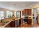 Well-appointed kitchen with granite countertops and stainless steel appliances at 1910 Morehead Hill Ct, Durham, NC 27703