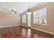 Bright living room with hardwood floors and large windows at 1910 Morehead Hill Ct, Durham, NC 27703