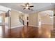 Spacious living room boasting hardwood floors and staircase at 1910 Morehead Hill Ct, Durham, NC 27703