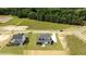 Beautiful aerial view of two modern homes with well-manicured lawns in a tranquil neighborhood setting at 200 Broadleaf Ln, Youngsville, NC 27596