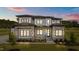 Stunning two-story home with stone accents, manicured lawn, and professional landscaping at 200 Broadleaf Ln, Youngsville, NC 27596