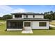 Exterior rear of house shows patio, siding, and multiple windows at 200 Broadleaf Ln, Youngsville, NC 27596