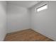 This room offers hardwood floors, a window, and neutral paint at 200 Broadleaf Ln, Youngsville, NC 27596