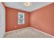 Carpeted bedroom with a window providing natural light at 205 Lizzie King Ct, Willow Springs, NC 27592