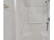 Accessible shower with handrails and adjustable shower head at 205 Lizzie King Ct, Willow Springs, NC 27592