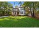 Stunning white two-story home with a spacious front yard and inviting front porch at 211 Page St, Morrisville, NC 27560