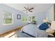 Serene bedroom with natural light, hardwood floors, and cozy window seating at 223 Hawthorne Rd, Raleigh, NC 27605