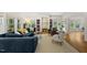 Bright, stylish living room with fireplace, built-in shelves, and hardwood floors at 223 Hawthorne Rd, Raleigh, NC 27605