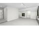 Unfinished basement with carpet and built in shelves at 2238 Lakeview Ter, Burlington, NC 27215