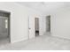 Neutral bedroom with carpet and doors leading to other rooms at 2238 Lakeview Ter, Burlington, NC 27215
