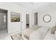Staged bedroom with doors to other rooms and a painting on the wall at 2238 Lakeview Ter, Burlington, NC 27215
