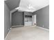 Spacious bedroom with built-in shelving and storage, complemented by a ceiling fan at 2238 Lakeview Ter, Burlington, NC 27215