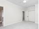 This is a bright and airy bedroom with a neutral color scheme and a closet at 2238 Lakeview Ter, Burlington, NC 27215