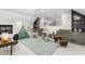 ' bonus room with large carpet, toys, teepee and built in shelves at 2238 Lakeview Ter, Burlington, NC 27215