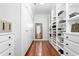 Well-organized walk-in closet featuring custom shelving and ample storage space at 2238 Lakeview Ter, Burlington, NC 27215