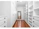 Spacious walk-in closet featuring custom shelving and ample storage space at 2238 Lakeview Ter, Burlington, NC 27215