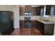 Well-equipped kitchen boasting granite countertops and modern, stainless-steel appliances at 236 Bragg Ln, Hurdle Mills, NC 27541