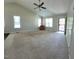 Bright living room featuring vaulted ceilings and ample natural light at 236 Bragg Ln, Hurdle Mills, NC 27541