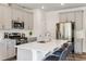 Contemporary kitchen with a large island, stainless steel appliances, and ample cabinet space for storage at 244 Paramount Dr # 24, Smithfield, NC 27577