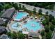 Expansive aquatic center featuring multiple pools, slides, and recreational areas for all ages at 3002 Remington Oaks Cir, Cary, NC 27519