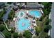 Aerial view of the community pool highlighting various water features and recreational amenities at 3002 Remington Oaks Cir, Cary, NC 27519