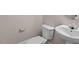 Powder room featuring a toilet, and sink at 3002 Remington Oaks Cir, Cary, NC 27519