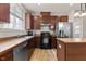 Updated kitchen with wood cabinets and stainless steel appliances at 3002 Remington Oaks Cir, Cary, NC 27519