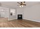 Bright living room with wood floors and fireplace at 3002 Remington Oaks Cir, Cary, NC 27519
