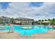 Community pool and recreation area with a large pool, waterslides, and splash pad at 3002 Remington Oaks Cir, Cary, NC 27519