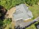 An aerial view of this home shows the property's layout, including the back patio and driveway at 306 Holland Rd, Fuquay Varina, NC 27526
