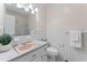Bathroom features a unique sink, tile backsplash, and a shower with sliding glass doors at 306 Holland Rd, Fuquay Varina, NC 27526