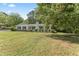 This home features a traditional-style with manicured landscaping, offering beautiful curb appeal at 306 Holland Rd, Fuquay Varina, NC 27526