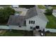 Aerial view of home's backyard with deck, storage shed, and perimeter fencing at 309 Westfield Dr, Dunn, NC 28334